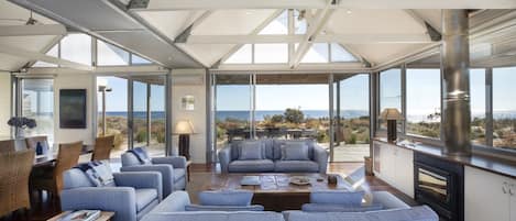 Fabulous living room, surrounded by decks, double doors and out to the dunes.