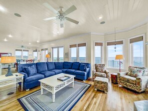 The open concept main living space, next to the kitchen and dining area