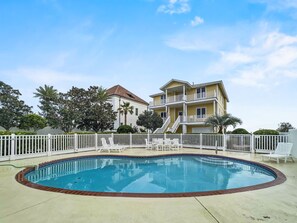 3-5ft. depth with ascending stairs and poolside  dining area and loungers