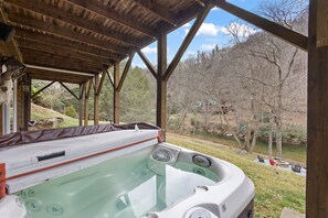 Hot Tub on the Lower Level Overlooking the River and Fire Pit