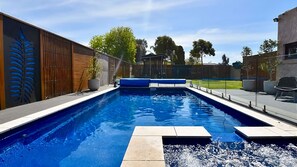 Our inviting pool and spa promise a delightful experience for all.