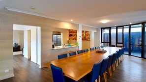 Large dining area that accommodates 18 people.