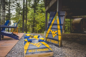 Celebrate the spirit of West Virginia on themed cornhole boards. Who will win?