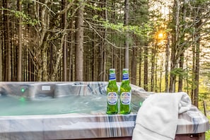Relax and rejuvenate in our private hot tub while enjoying the sunset