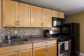 Prepare meals in the studio's full kitchen