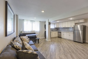 The great room and kitchen area allow a family to spend time together.