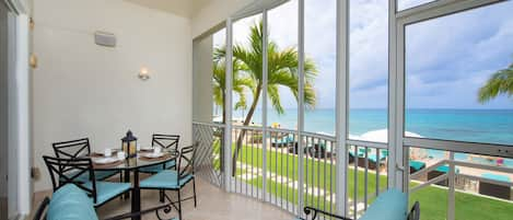 All photos are current as of January 2023. Enjoy oceanfront living from this unit's screened porch.