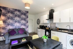Sofa bed in the open plan kitchen,living and dining area