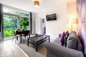 Open plan living area with easy access to the shared garden