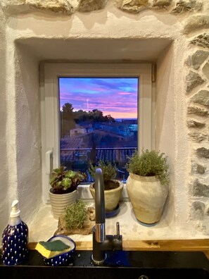 Kitchen window with sea view and sunrise view