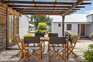 Enjoy alfresco dining in the patio complete with a barbecue, making it ideal for outdoor gatherings.
