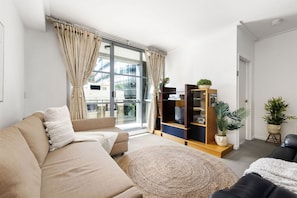 A living area with TWO 3-seater sofa beds that folds out to doubles.