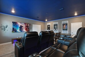 Enjoy your favorite films in our cozy in-house movie theater, complete with comfortable seating.