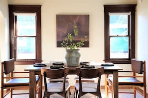 Serve your delicious meals easily at the lovely dining table.