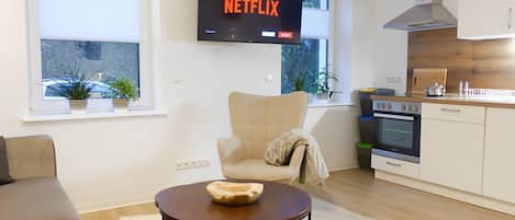 Sitzbereich mit schenkbarem Fernseher inkl. NETFLIX