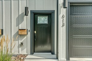 Front door with key pad for entry. 