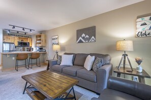 Open Living area with Mountain Modern furnishings, and featuring local art