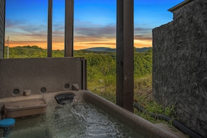 Unwind in the hot tub and soak in the scenic mountain views.