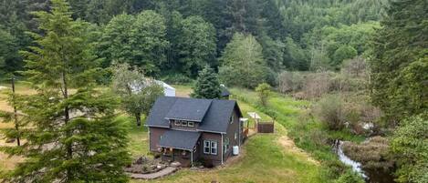 Property with the beaver pond behind the house