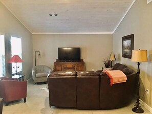 Living area w/ reclining sofa