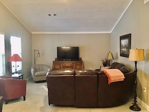 Living area w/ reclining sofa