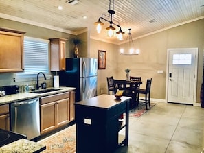 Open kitchen, dining, living area