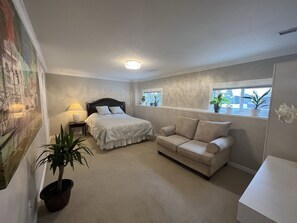 spacious bedroom with queen size bed