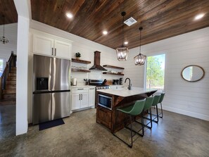 Luxury kitchen and bar stools - fully stocked w/sliding door to patio