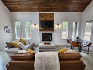 Comfy, cozy living room & dining area - watch movies, play games and dine