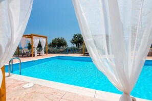 Dive into serenity at our luxurious pool oasis