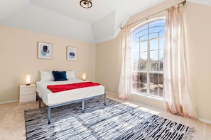 Welcome to our modern and luxurious bedroom, where comfort and style come together to create the perfect sanctuary for your stay.