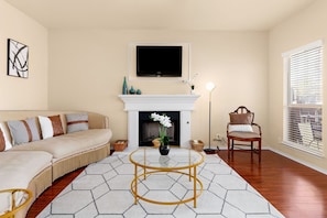 Relax on our plush sofa, read a book or watch your favorite movie on the large flat-screen TV. With its minimalist design and muted color scheme, the living room creates a calming and peaceful atmosphere, perfect for unwinding after a busy day exploring th