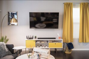 65 inch TV with ROKU and soundbar for the homebodies who just want to stay in!