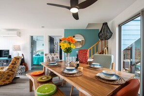 Downstairs Dining room has views of the front yard and flows into bedroom 2.