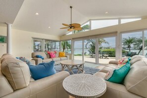 Sunroom overlooking the intercoastal waters, the pool and the patio