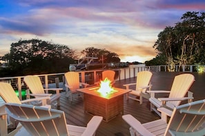 Relax with friends and family at the fire pit and watch the sunset over beautiful waterfront