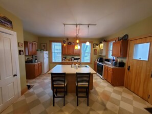 Kitchen island and entertainment space 