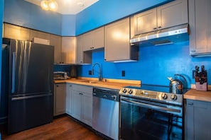 Well-stocked Kitchen with New Appliances