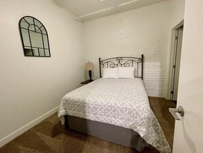 Master suite with attached bathroom and walk-in closet