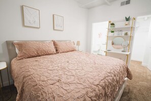 Master suite with king bed, private bathroom and walk in closet