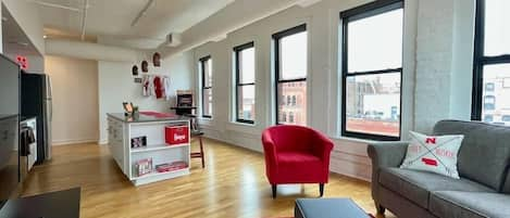 Enjoy 1,300 square feet, great downtown views and in-room entertainment all wrapped with Husker memorabilia throughout.