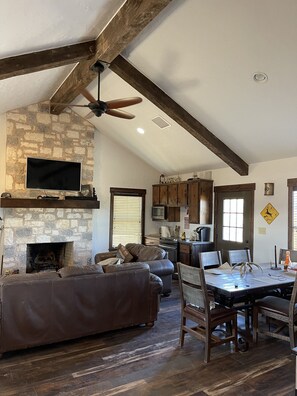 bunkhouse living room, dining table, & kitchenette