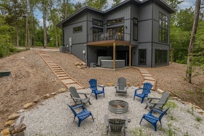 Enjoy lofted views of the Innsbrook valley below from the expansive deck or while relaxing in the hot tub