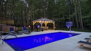 Start your vacation here—your own private, heated pool tucked in the woods. Enjoy the sound of nature and your crew having a blast.