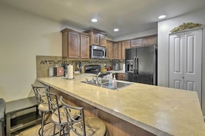 Kitchen w/ Breakfast Bar | Main Level
