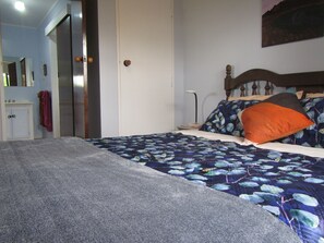 Queen bed , closet and bathroom