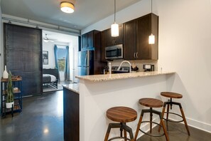 Fully equipped kitchen with stainless steel appliances