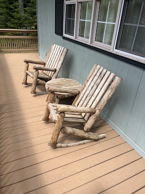 Enjoy a drink on the front porch.  Rocking ADK chairs with table.