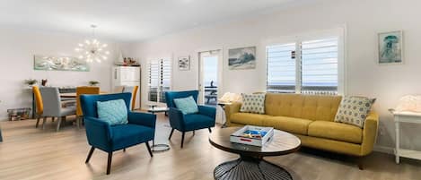 Enjoy a gorgeous view of the ocean from this spacious living room!