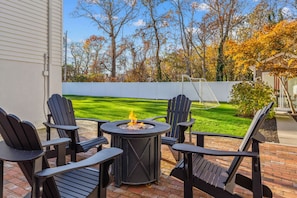 After playing a game of soccer, enjoy roasting s'mores around this firepit, underneath the string lights.